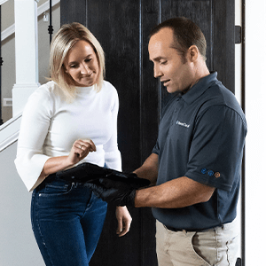 Green Clean team member working with a customer