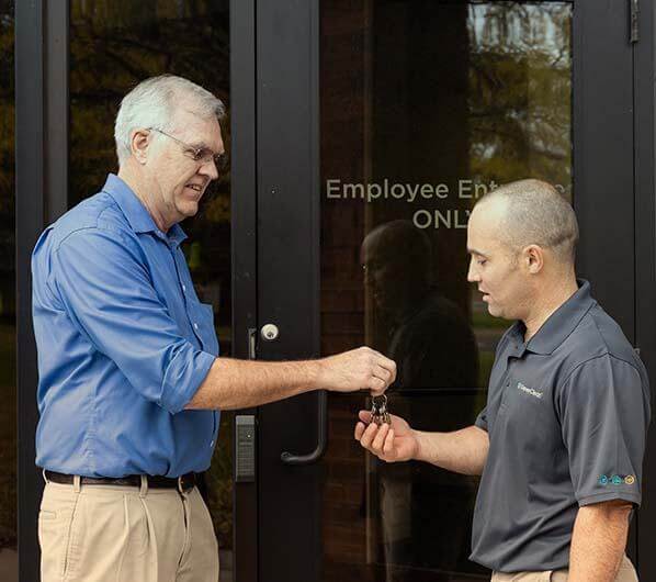 A Green Clean team member working with a customer